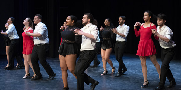 students dancing in pairs